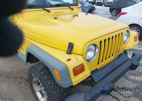 2000 Jeep Wrangler Sport from USA, damaged, VIN 1J4FA49SXYP743605